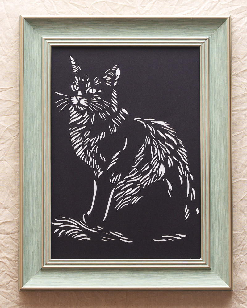 Hand-cut lion cat silhouette portrait in paper cut art style