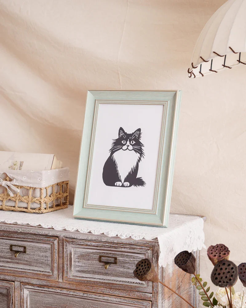 Watch sunlight bring her paper spirit alive: Dancing paw-shadow proofs she guards this home