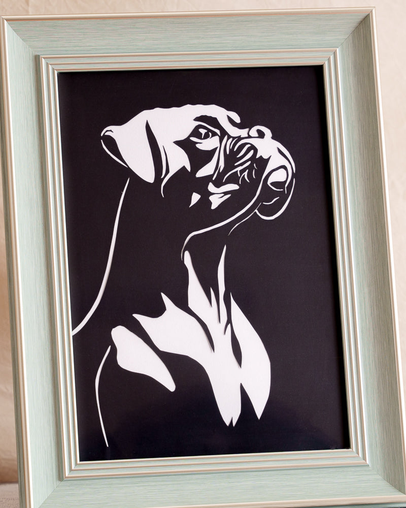 Look closely to see the bulldog's handsome expression perfectly captured in this paper-cut