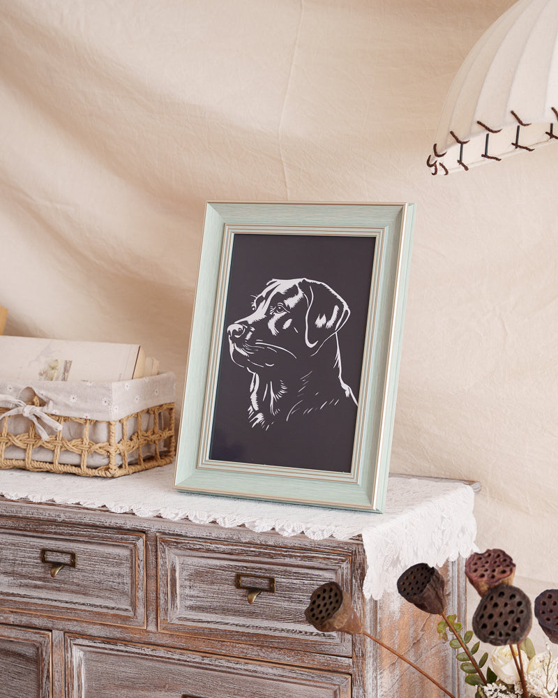 Pet memorial paper-cut decor piece in living space
