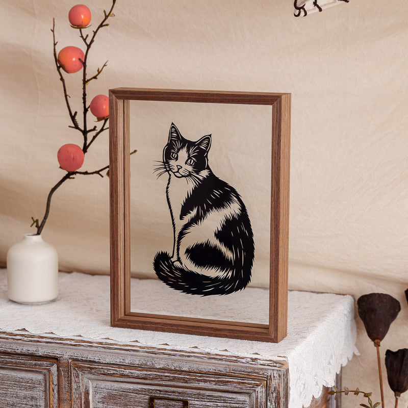 A delicate cat memorial papercut artwork, crafted to honor the life and memory of a departed feline companion