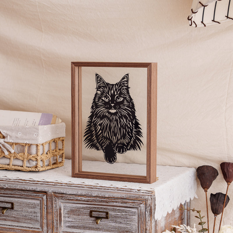 Handmade Maine Coon cat silhouette papercut memorial, designed as a home decoration to honor and remember a beloved pet.