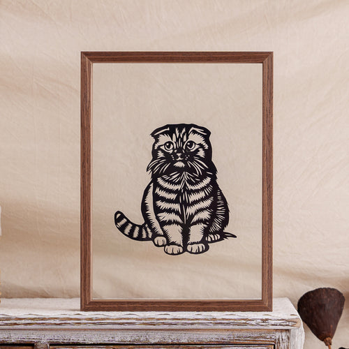 Handmade silhouette papercut artwork of a kitten with a sad, drooping expression, created as a unique memorial keepsake.