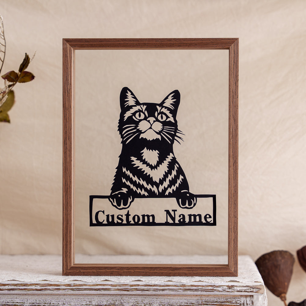A personalized papercut memorial featuring your cat’s name sign, made to honor their memory.