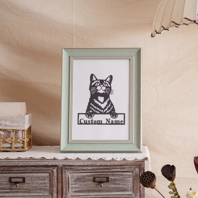 Hand-cut paper cat portrait with engraved pet name