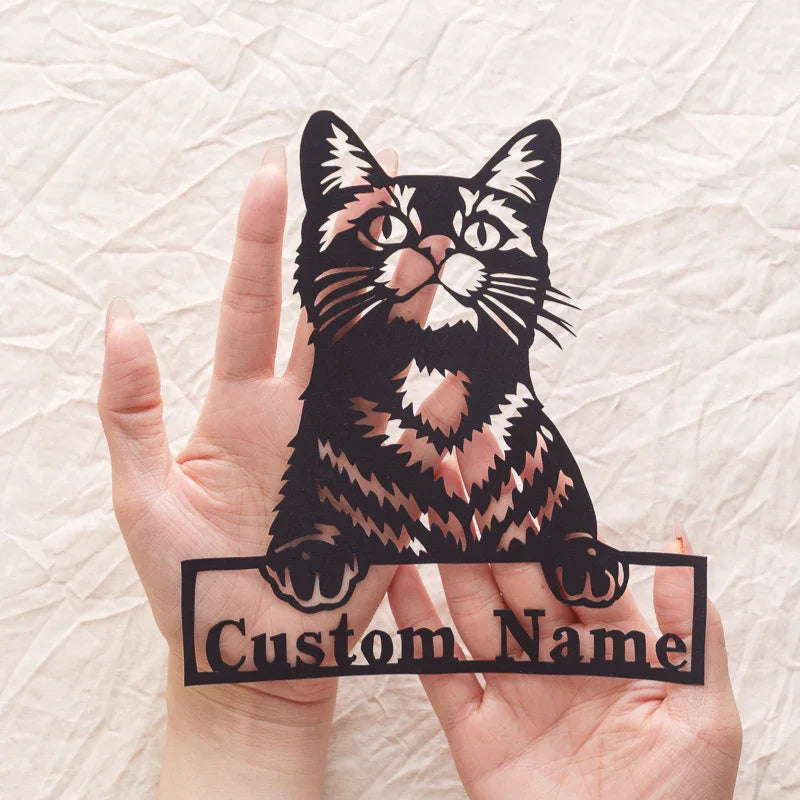 Custom paper-cut artwork featuring your beloved cat's portrait and name, held on hand​