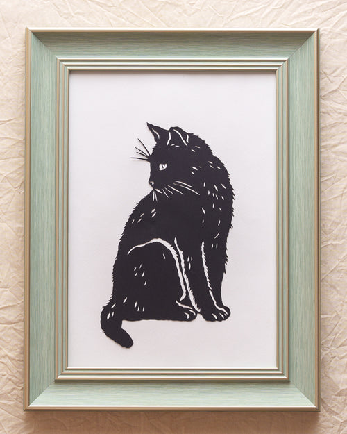 Hand-cut silhouette of a cat created as a pet memorial artwork