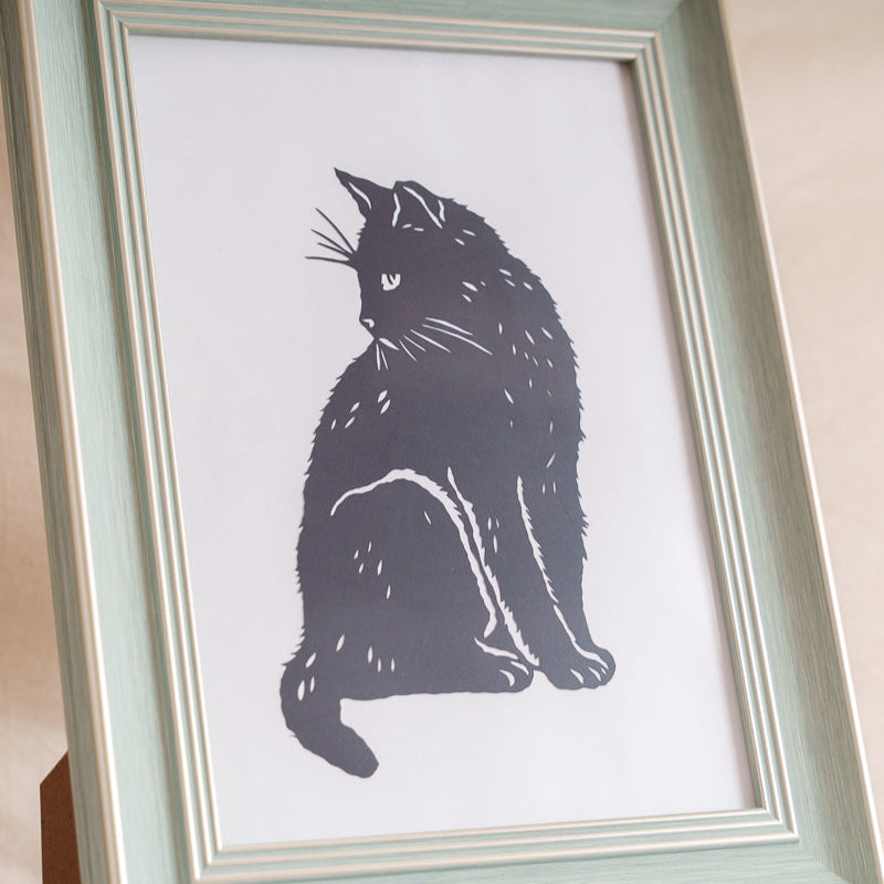 Custom cat paper cut memorial framed in a picture frame, a heartfelt gift to remember a beloved cat.