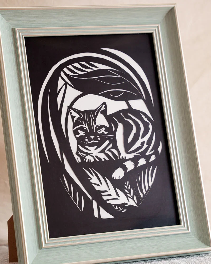 Getting close to see every detail of my cat's paper-cut art