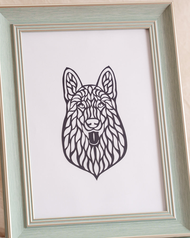 Close-up detail showcasing the artistry of a hollow-cut paper design, highlighting its negative space and intricate patterns in an abstract or nature-inspired style
