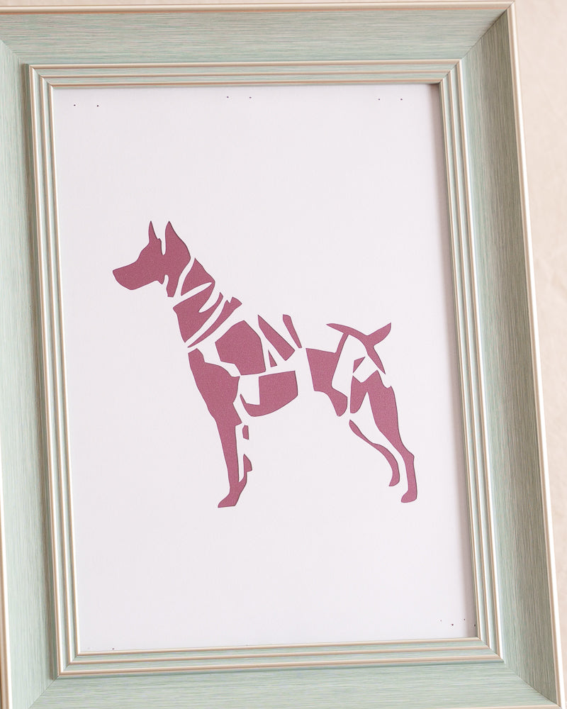 A touching piece of pet memorial art: custom paper cut symbolizing where a beloved dog's spirit resides