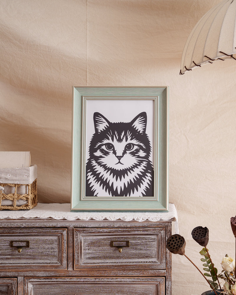 A carefully crafted cat paper-cut artwork placed on a shelf or wall, adding a personalized touch to home decor