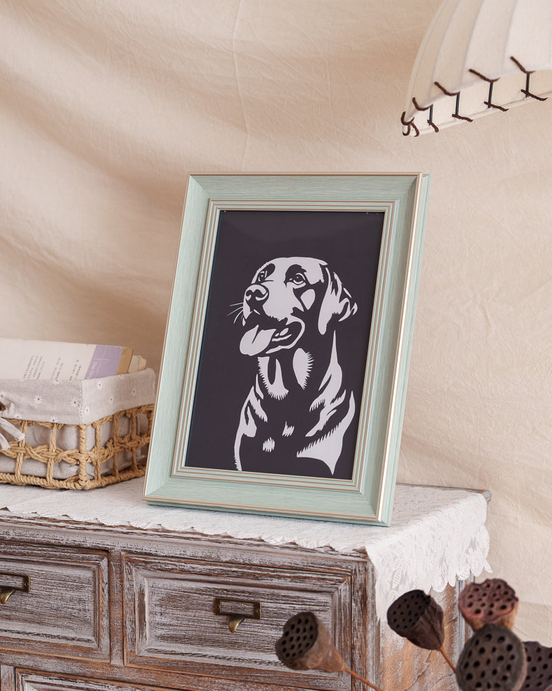 Labrador paper cut displayed at home as a pet memorial