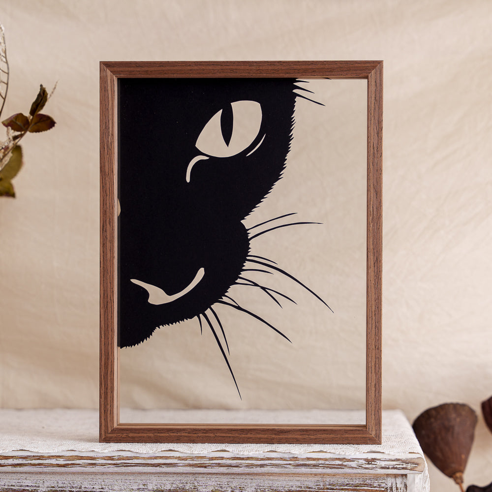 A detailed close-up papercut portrait of a cat, capturing its facial features and subtle expressions with fine craftsmanship.