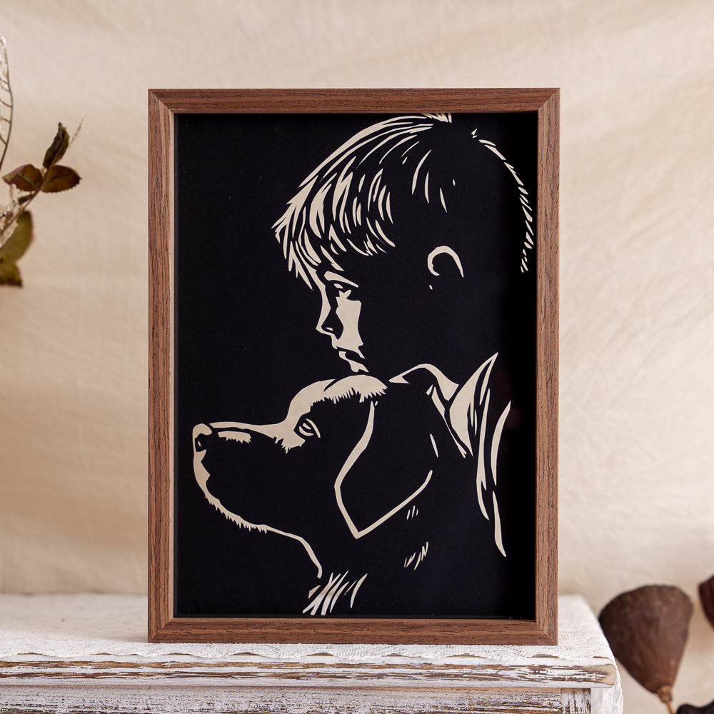 A warm and tender papercut memorial capturing the moment a child rests their chin gently on their dog’s head — a beautiful symbol of love and trust.
