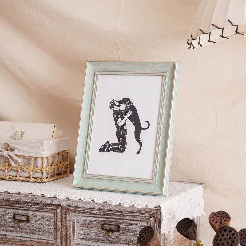 A paper cut artwork of a dog leaping to kiss its owner—capturing timeless love that endures beyond life. Displayed at home, it becomes a cherished presence where memories forever embrace the spirit of your furry angel