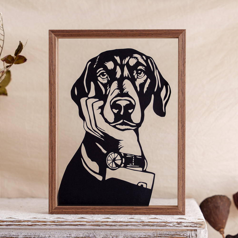 A heartfelt memorial papercut showing a tender moment — the owner gently holding the dog’s chin, capturing a deep bond of love and trust.