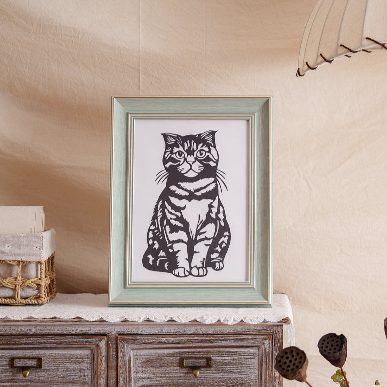 er portrait now commands the mantel — 3pm sunbeams still warm her favorite paper nap spot. Duty shift: complete 