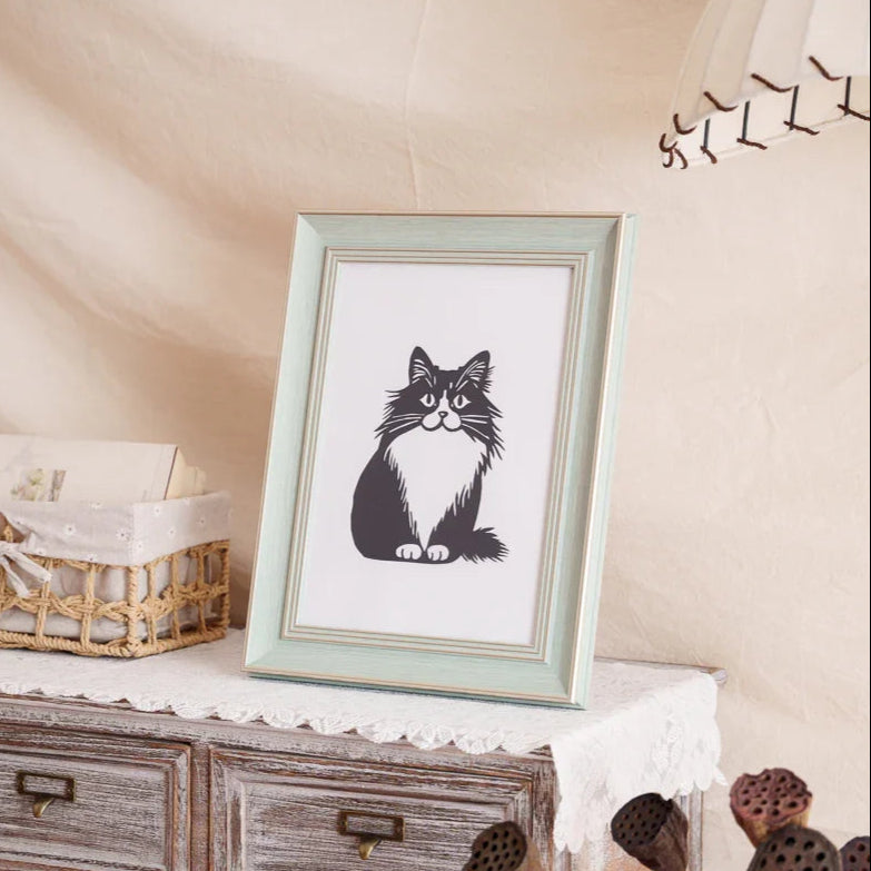 Watch sunlight bring her paper spirit alive: Dancing paw-shadow proofs she guards this home