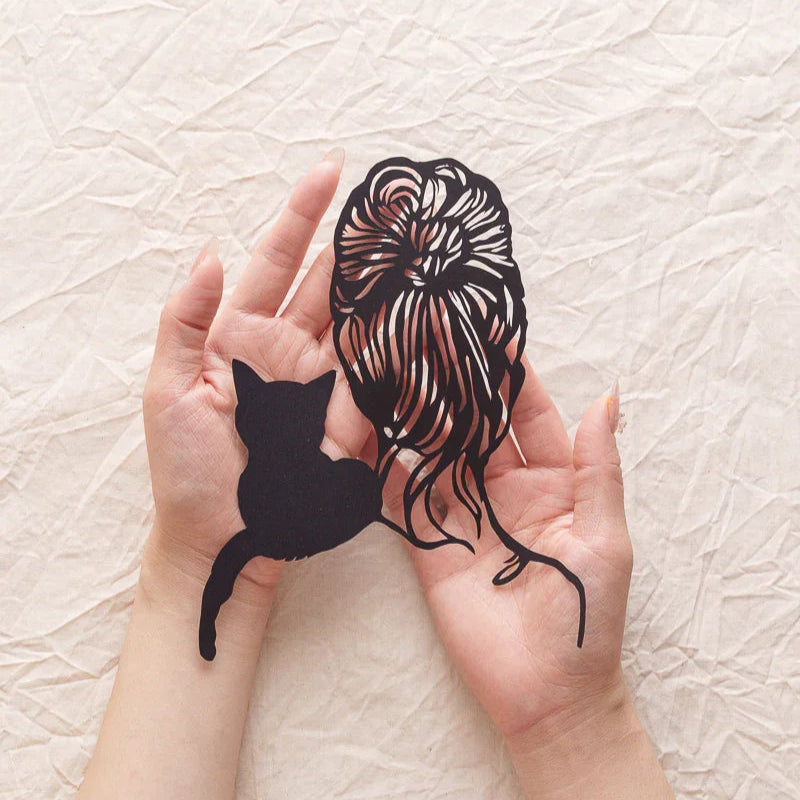 ​​Handraising My Cat silhouette paper cut