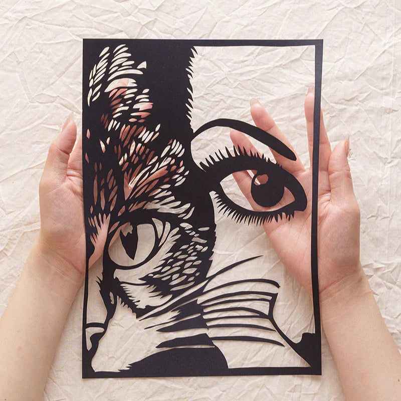 My fur baby & me as paper cut art — sitting right in my palm now