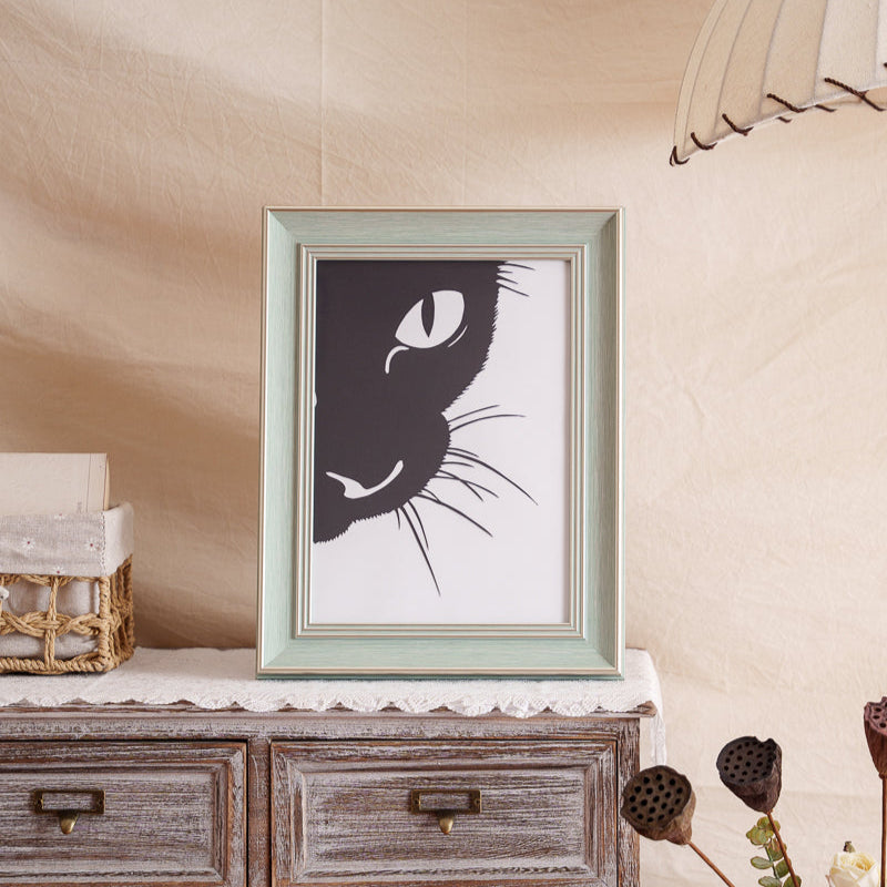 A pet paper cut memorial displayed on a shelf as home decor