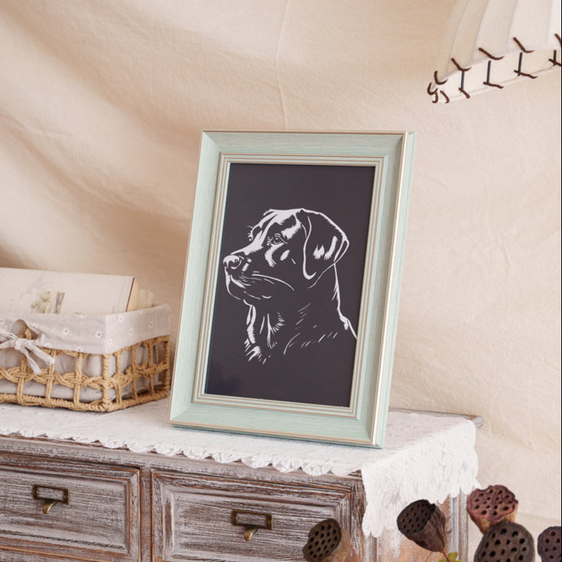 Pet memorial paper-cut decor piece in living space
