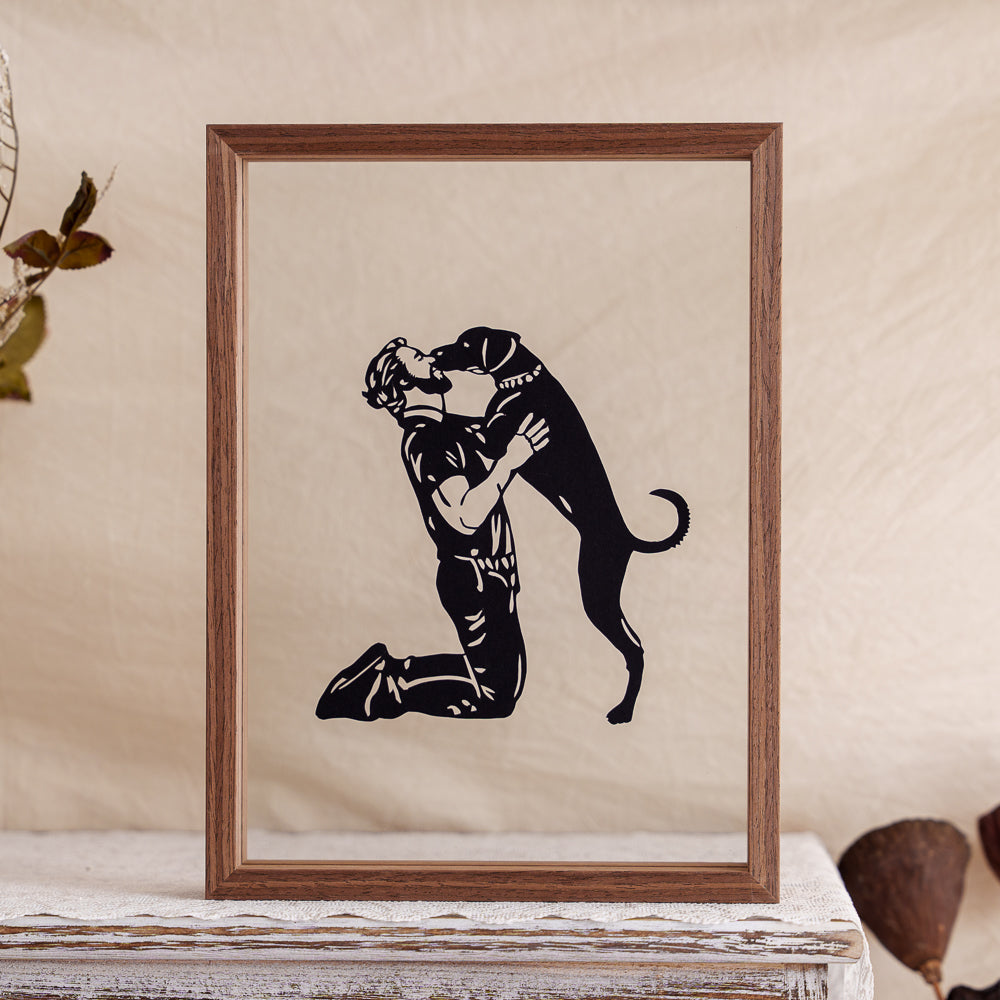 A touching papercut memorial showing a soldier kneeling down to kiss their loyal dog — a tribute to love, loyalty, and reunion.