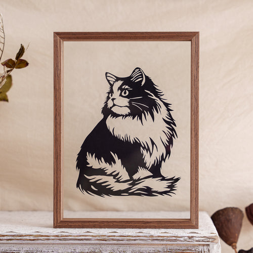 A black and white cat silhouette paper cut artwork showing a seated cat