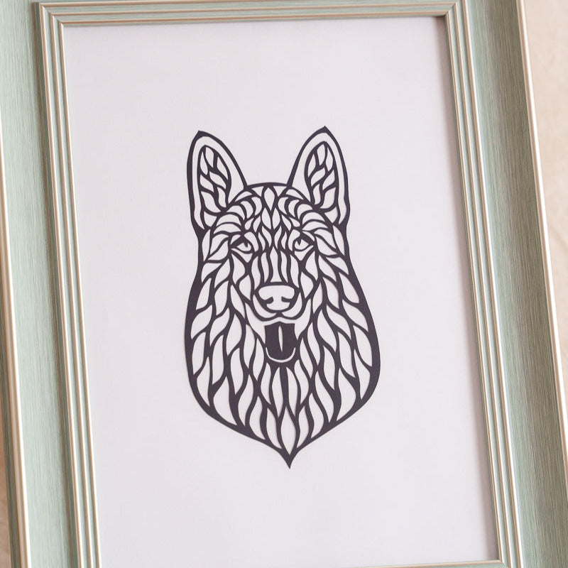 Close-up detail showcasing the artistry of a hollow-cut paper design, highlighting its negative space and intricate patterns in an abstract or nature-inspired style