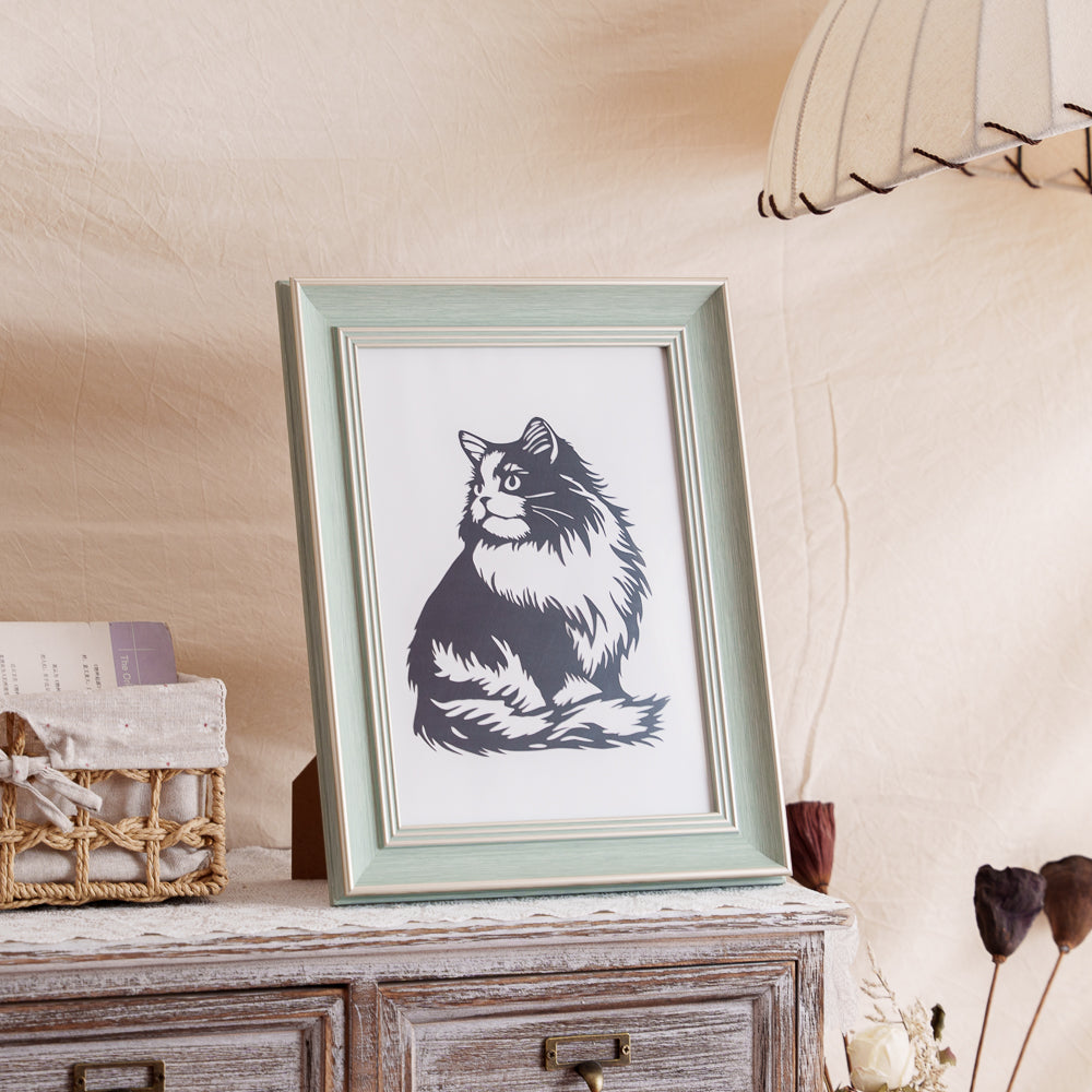Framed cat paper cut artwork created as a memorial keepsake