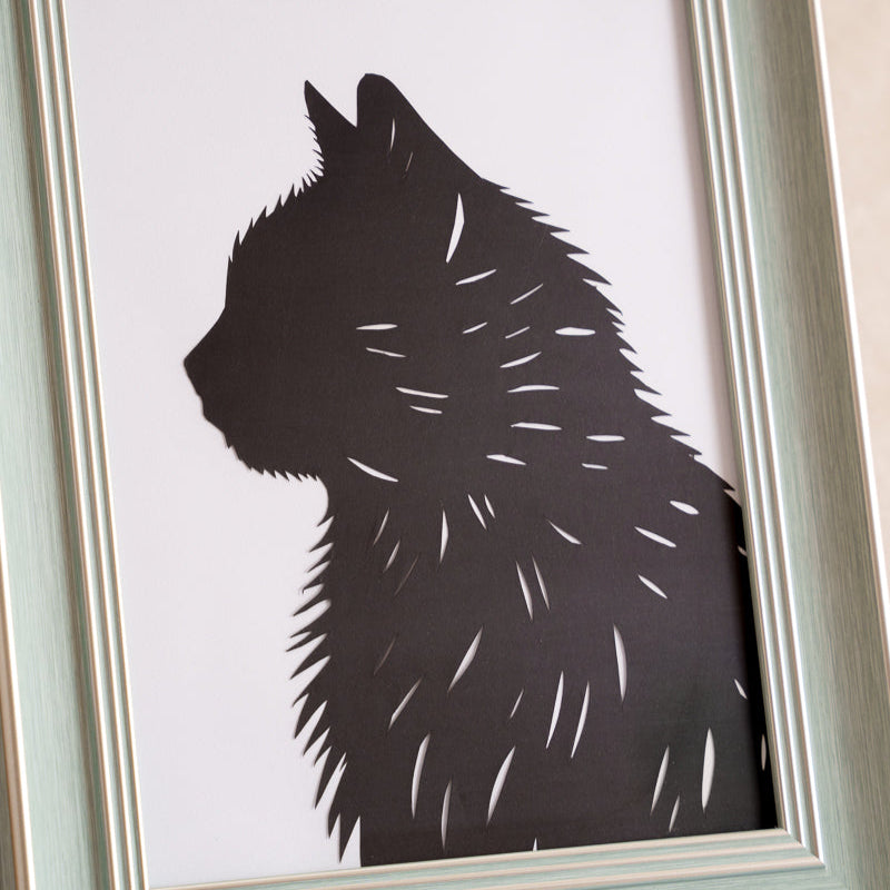 A touching paper cut artwork depicting a cat's spirit, designed as a personalized memorial